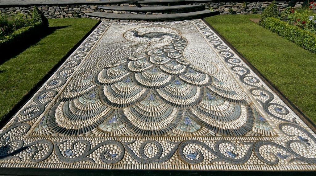 Pebble mosaic peacock design