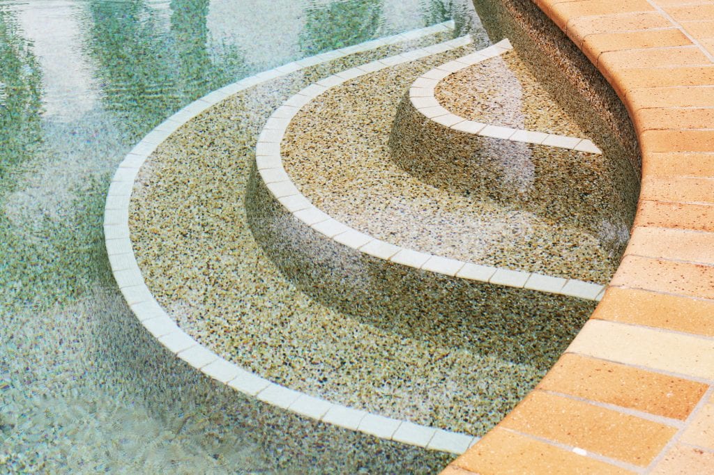 Pebble tile pool steps